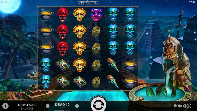 Игровое поле автомата Atlantis с барабанами на фоне древних пирамид