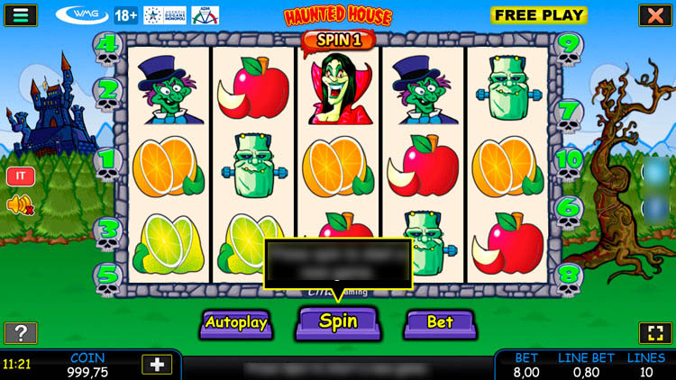 Игровой автомат Haunted House с мрачным особняком на заднем плане