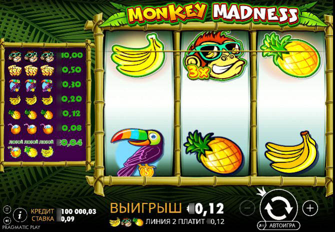 Игровой экран Monkey Madness с барабанами в обрамлении бамбука на фоне тропического леса